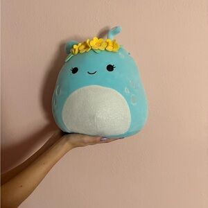 Squishmallows Blue Stuffed Animal with Yellow Flowers